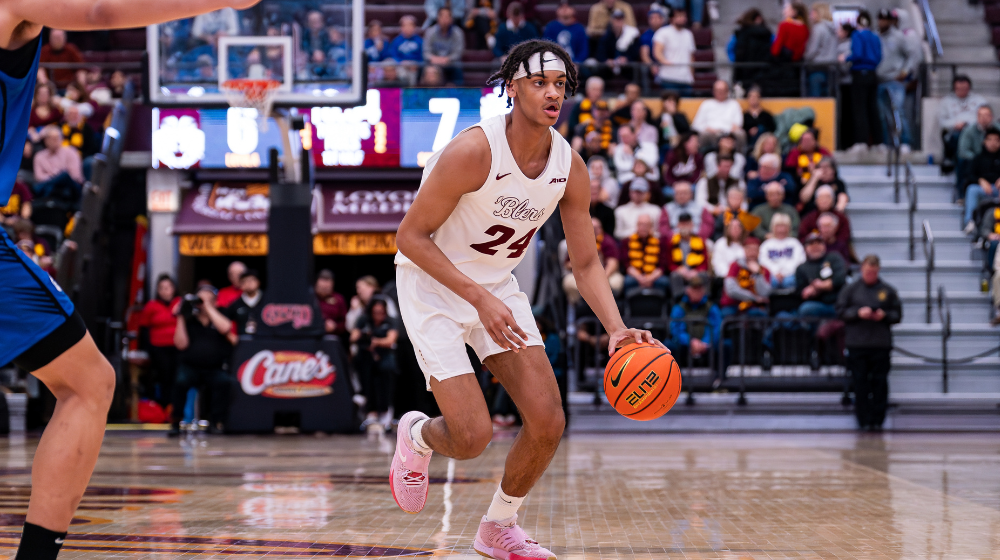 A student-athlete playing basketball